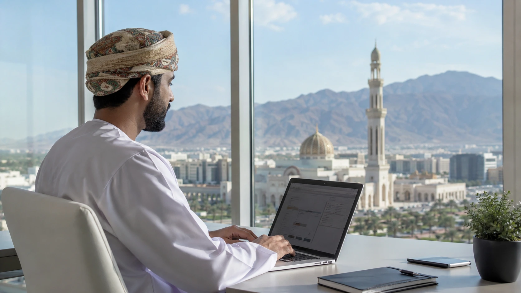 : Omani SME team using a cloud-based business application